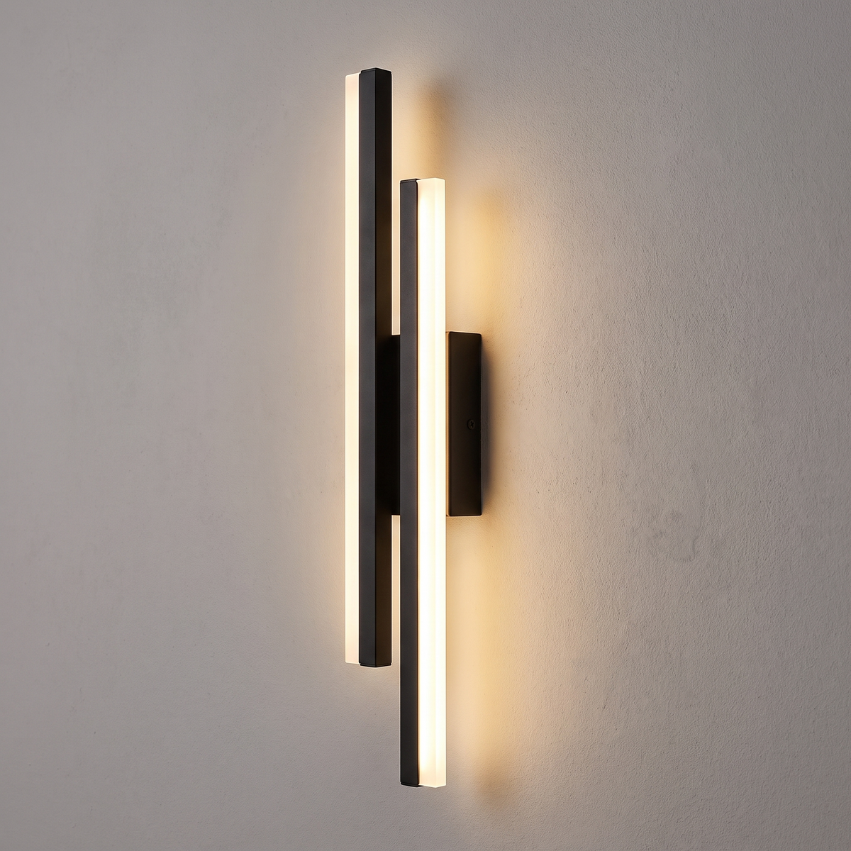 Copper-effect LED wall light in black finish